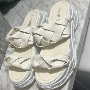 Size 9. Slide on sandals.